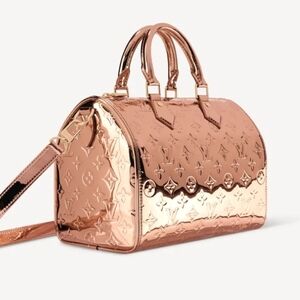 NWT ROSE GOLD SPEEDY